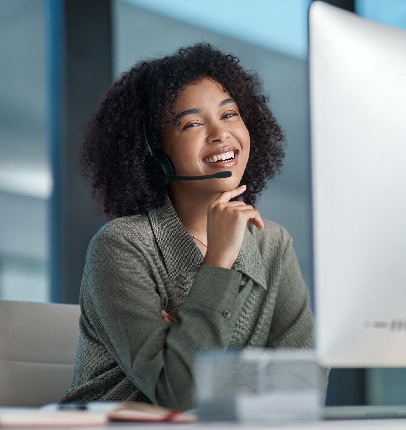 An educateU support advisor wearing a headset